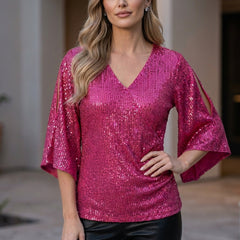 Rose red V-neck sequin summer blouse for women, stylish top with shimmering embellishments and flowy fabric.
