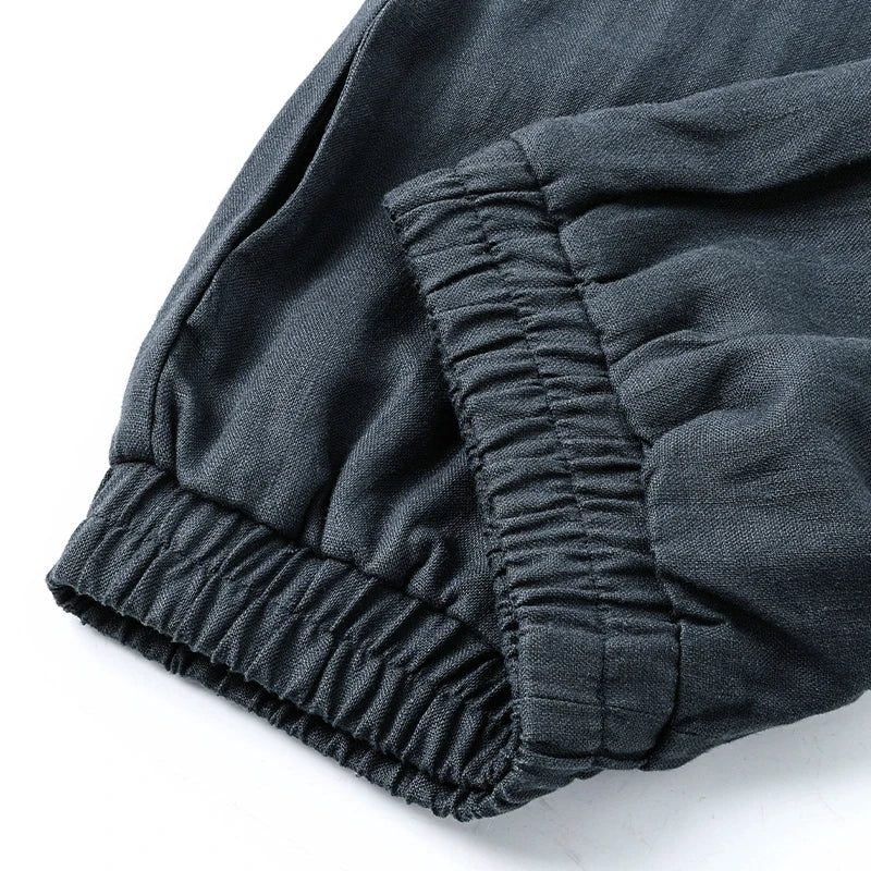 Linen cropped wide-leg drawstring trousers for women, loose pull-on style, in a light fabric perfect for casual summer wear.