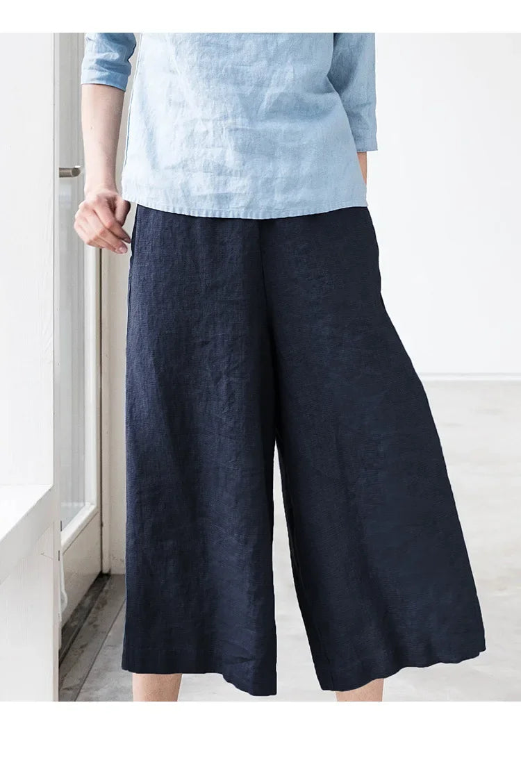 Linen cropped wide-leg drawstring trousers for women, loose pull-on style, light and breathable fabric, in neutral color.