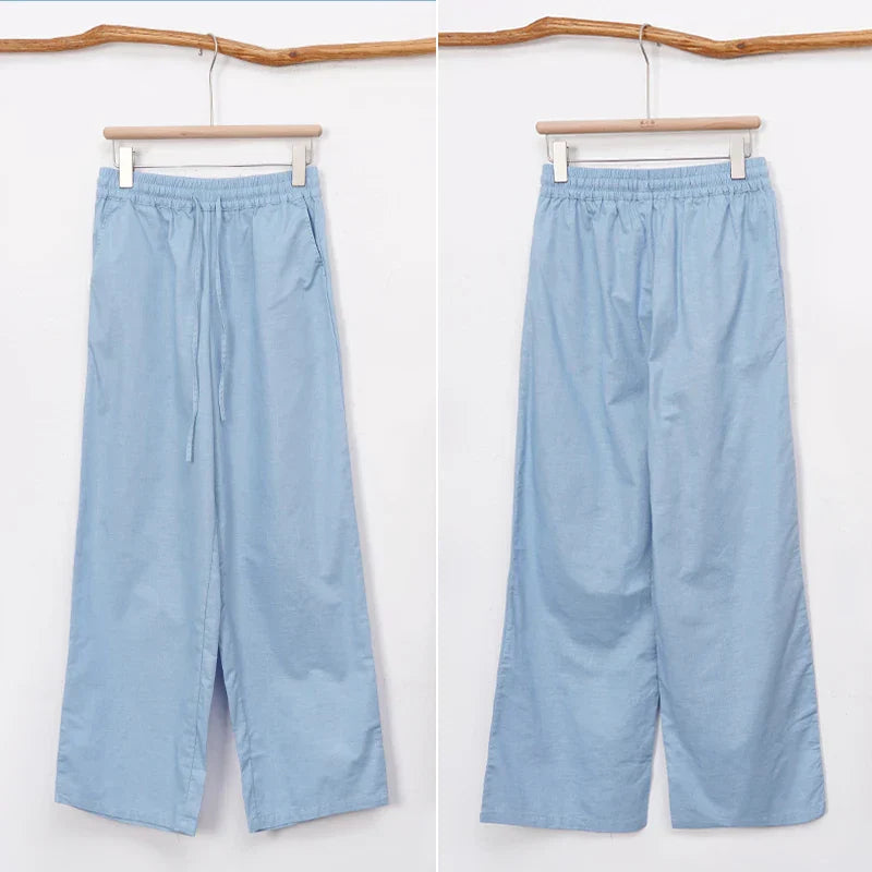 Light beige cotton linen wide-leg drawstring trousers for women, loose pull-on pants with relaxed fit and comfortable style.