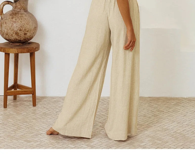 Light beige linen wide-leg trousers for women, loose pull-on pants with relaxed fit, comfortable and stylish for casual wear.