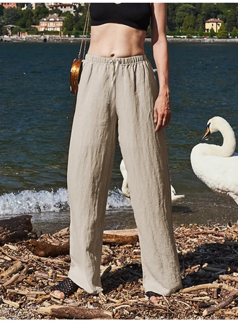 Women’s knit wide-leg drawstring trousers with a loose fit and pull-on design, featuring a comfortable and casual style.