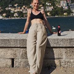 Knit wide-leg drawstring trousers for women, loose pull-on style, in soft fabric, featuring a relaxed fit and comfortable design.
