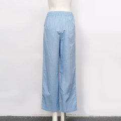 Light beige cotton linen wide-leg drawstring trousers for women with a loose, pull-on style and relaxed fit.