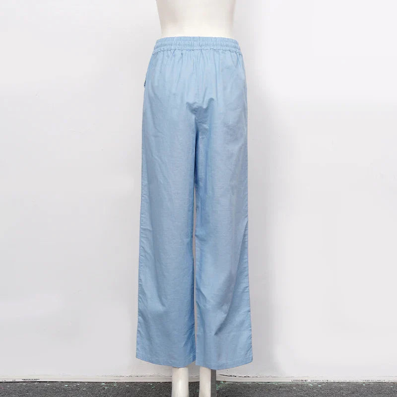 Light beige cotton linen wide-leg drawstring trousers for women with a loose, pull-on style and relaxed fit.