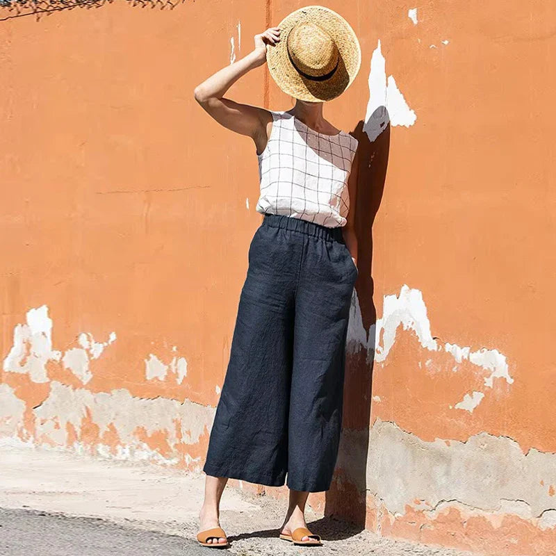 Linen cropped wide-leg drawstring trousers for women, loose pull-on style, beige color, comfortable and stylish casual pants.
