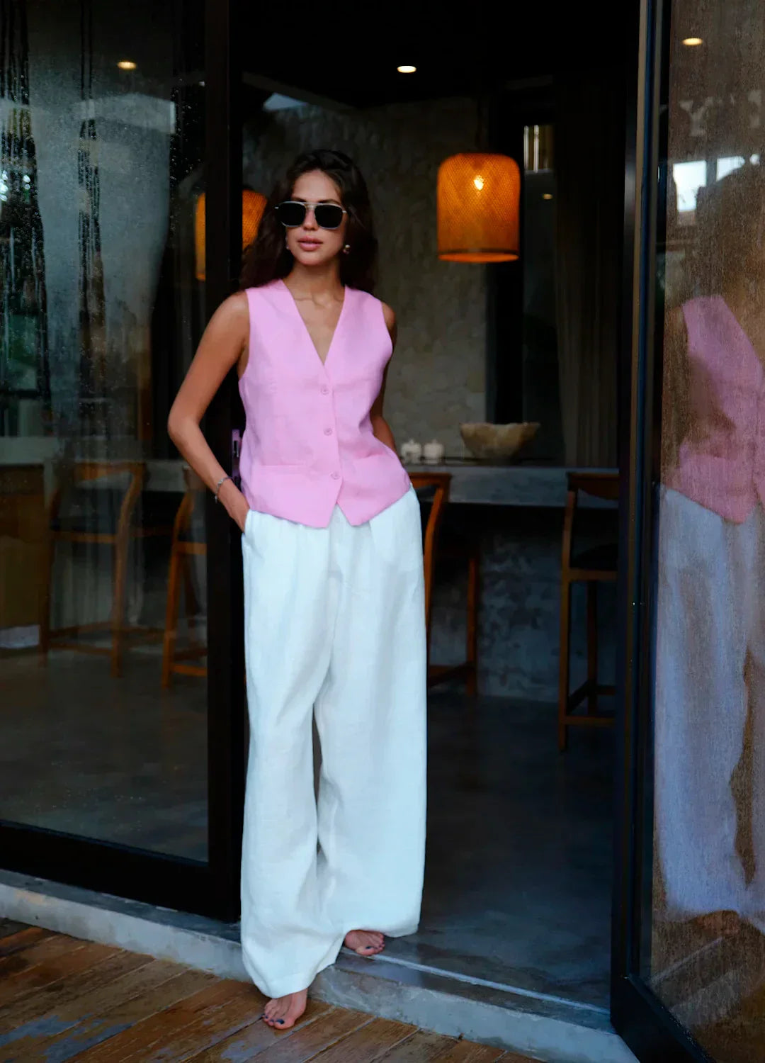 Women's high-waist wide-leg linen blend trousers with a loose pull-on design, shown in a stylish and comfortable fit.