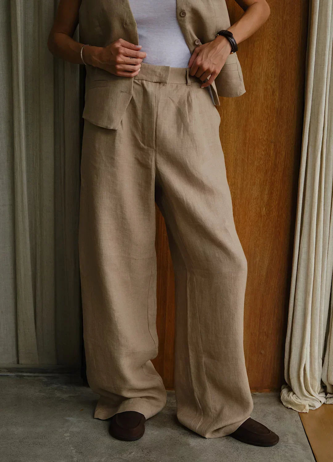Women's high-waist wide-leg linen blend trousers with a relaxed fit, pull-on style, perfect for casual or office wear.