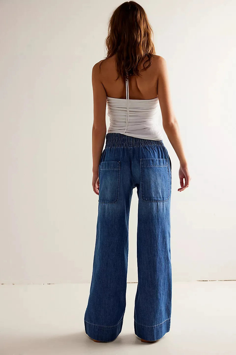 Blue denim wide-leg jeans for women featuring a relaxed fit, designed by My Store, displayed on a neutral background