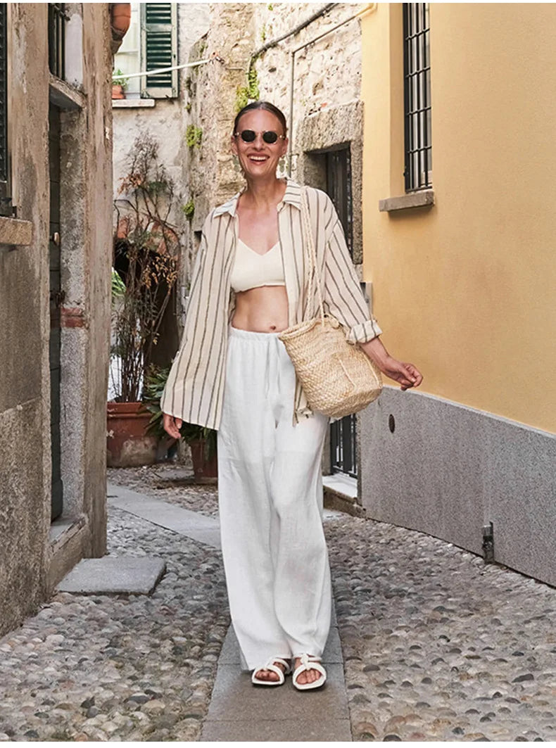 Knit wide-leg drawstring trousers for women, loose pull-on style, in a relaxed fit, made from soft, comfortable fabric.