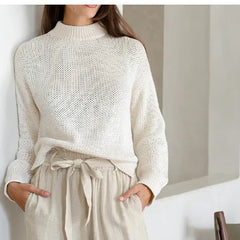 Light beige linen wide-leg trousers for women, loose pull-on pants with a relaxed fit and comfortable design.