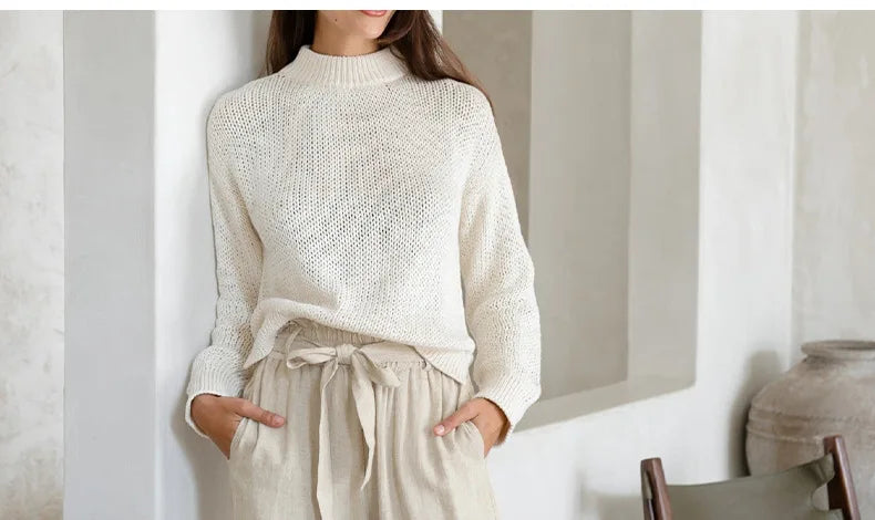 Light beige linen wide-leg trousers for women, loose pull-on pants with a relaxed fit and comfortable design.