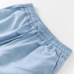 Women’s cotton linen wide-leg drawstring trousers with a loose fit, pull-on style, perfect for casual or relaxed wear.