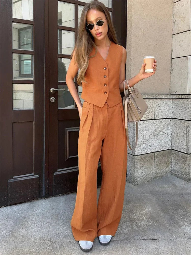 Women's white wide leg linen trousers with high waist, stylish and comfortable pants for casual or chic wear.