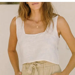 Light beige linen wide-leg trousers for women with a loose pull-on design, casual and comfortable for everyday wear.