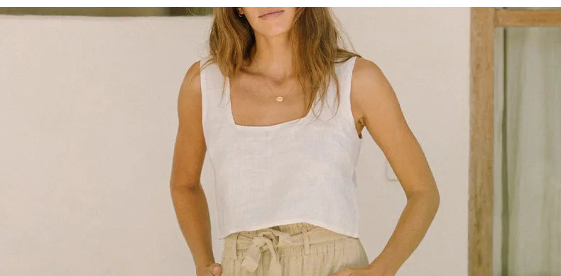 Light beige linen wide-leg trousers for women with a loose pull-on design, casual and comfortable for everyday wear.