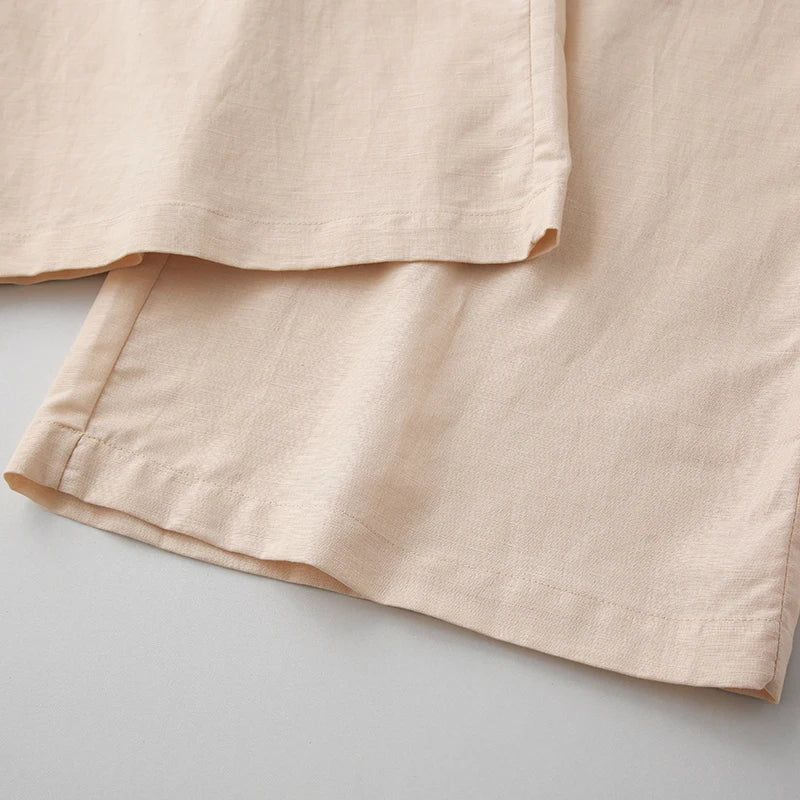 Light gray knit wide-leg trousers for women, loose pull-on pants with a relaxed fit and comfortable style.
