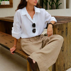 Women's high-waist wide-leg linen blend trousers with a loose pull-on fit, shown in a relaxed fit on a model.