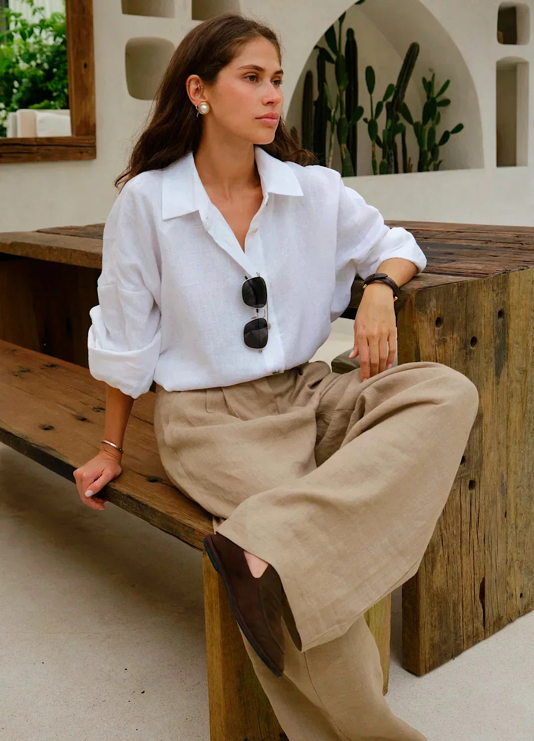 Women's high-waist wide-leg linen blend trousers with a loose pull-on fit, shown in a relaxed fit on a model.