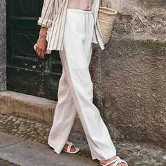 Knit wide-leg drawstring trousers for women with a loose, pull-on style and relaxed fit, featuring a soft, textured fabric.