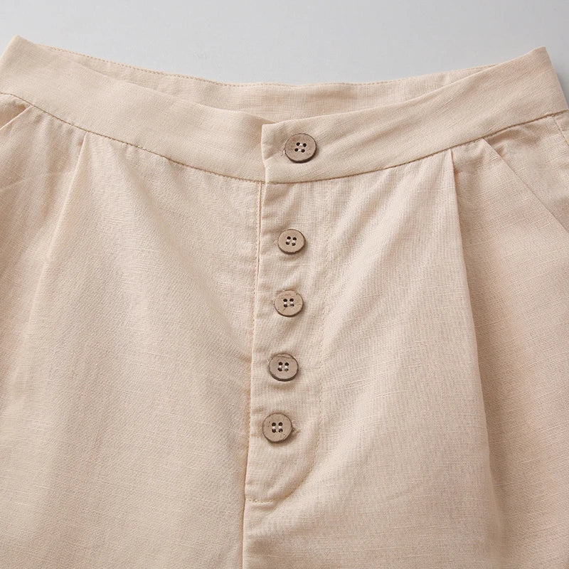 Light beige knit wide-leg trousers for women, loose pull-on style, soft fabric, and relaxed fit.