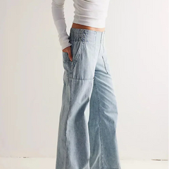 Blue denim wide-leg women's jeans with relaxed fit, casual pants for women, featuring classic denim fabric and stylish design.