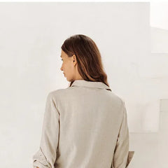 Light beige linen wide-leg trousers for women, featuring a loose pull-on style and relaxed fit, ideal for casual or comfortable wear.