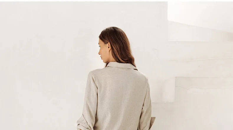 Light beige linen wide-leg trousers for women, featuring a loose pull-on style and relaxed fit, ideal for casual or comfortable wear.