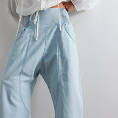 Women's pink sculpted harem-cut denim jeans featuring a relaxed fit, stylish design, and comfortable pants from My Store.