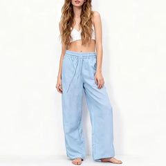 Women’s cotton linen wide leg drawstring trousers in a relaxed, loose fit with pull-on style, ideal for casual wear.