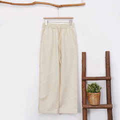 Women's cotton linen wide-leg drawstring trousers with a loose fit and pull-on design, perfect for casual and comfortable wear.
