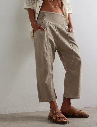 Loose fit harem-cut wide leg denim trousers for women, pull-on style, casual and comfortable denim pants.
