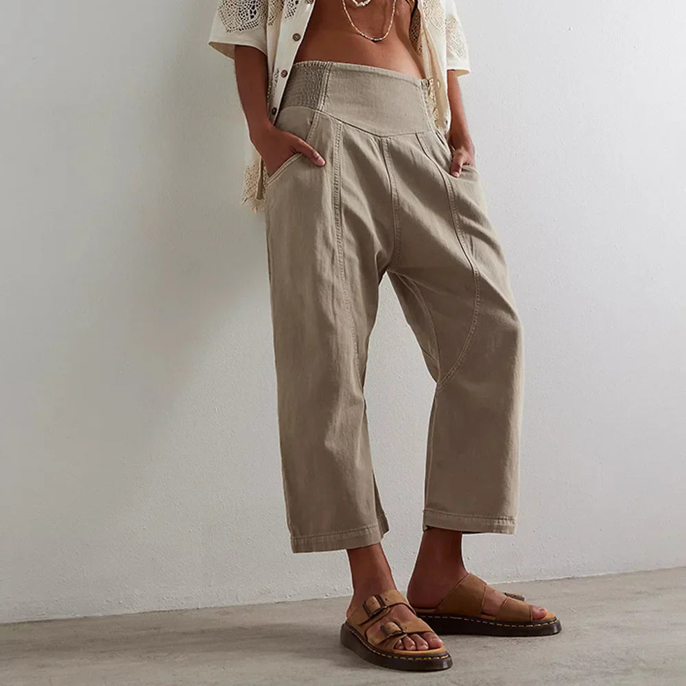Loose fit harem-cut wide leg denim trousers for women, pull-on style, casual and comfortable denim pants.