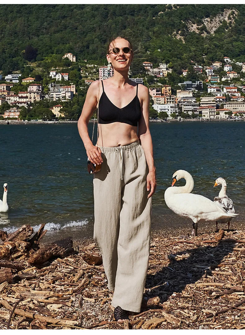 Knit wide-leg drawstring trousers for women, loose pull-on pants with a relaxed fit and comfortable style.