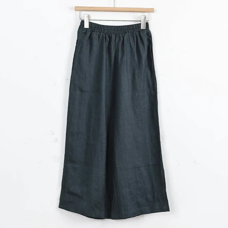 Linen cropped wide-leg drawstring trousers for women, loose pull-on style with relaxed fit and natural linen fabric.