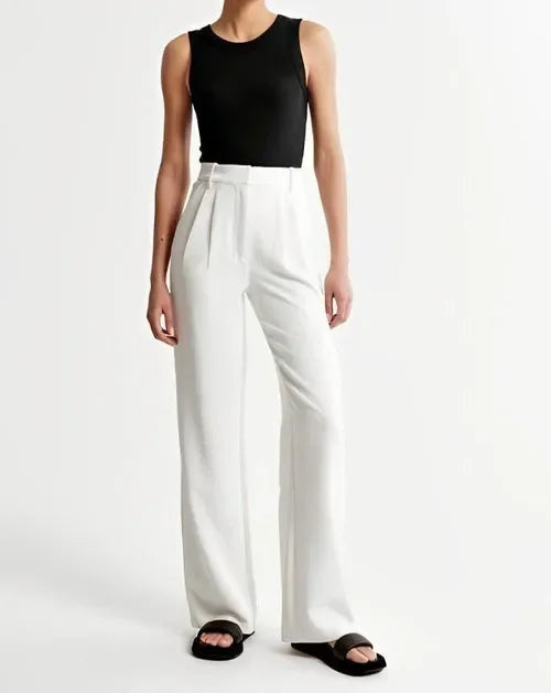 White wide-leg high-waist trousers for women, stylish and comfortable pants with a flattering high-waist fit.