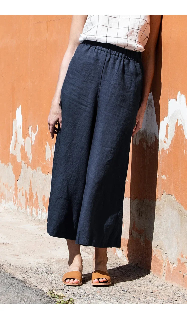 Linen cropped wide-leg drawstring trousers for women, loose pull-on pants, featuring a relaxed fit and lightweight fabric.