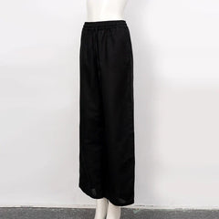 Loose cotton linen wide-leg women’s trousers with drawstring waist, pull-on style, comfortable and breathable casual pants.