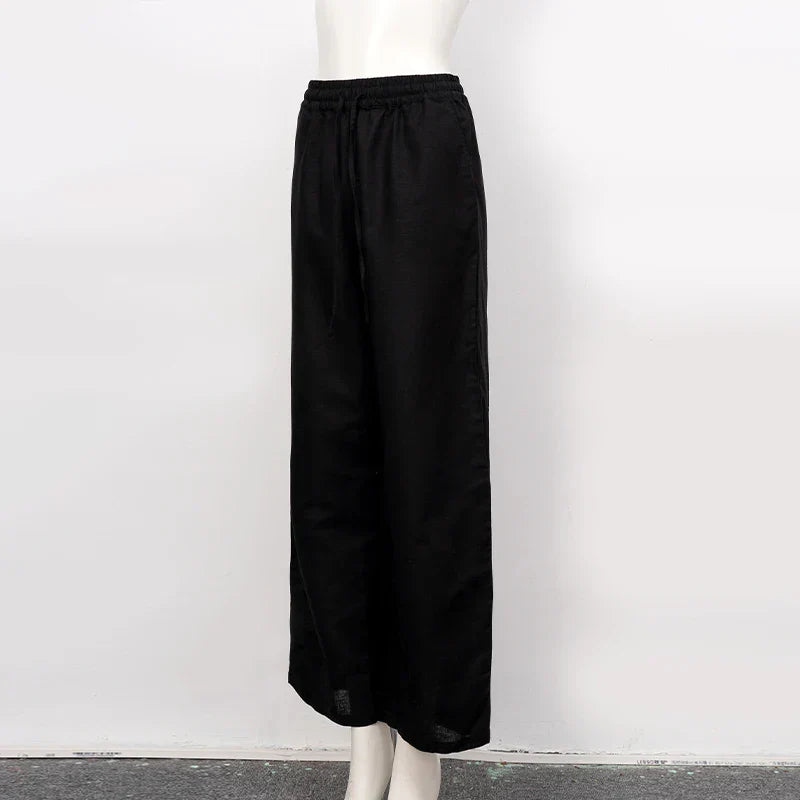 Loose cotton linen wide-leg women’s trousers with drawstring waist, pull-on style, comfortable and breathable casual pants.