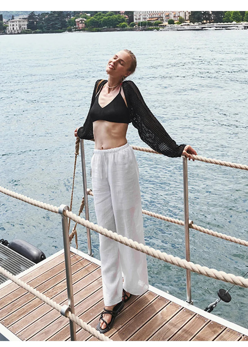 Women’s knit wide-leg drawstring trousers with a loose pull-on style, featuring a relaxed fit and comfortable waistband.