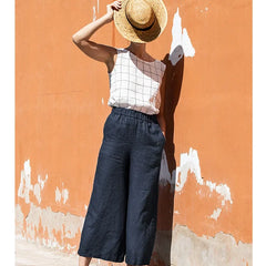 Linen cropped wide-leg drawstring trousers for women, loose pull-on style, beige color, casual and comfortable fit.