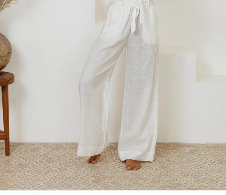 Linen wide-leg loose pull-on trousers for women, featuring a relaxed fit and breathable fabric in a natural linen color.