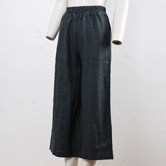 Linen cropped wide-leg drawstring trousers for women, loose pull-on style, in soft fabric with relaxed fit and casual design.