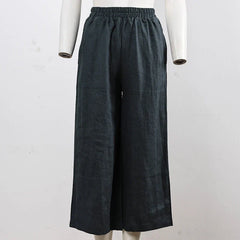 Light beige linen cropped wide-leg drawstring pants for women, featuring a relaxed fit and pull-on style.
