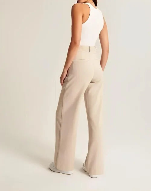White wide-leg high-waist trousers for women, stylish high waist pants with a relaxed fit and modern design.