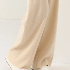 Women’s Merino wool joggers with wide-leg fit, soft and comfortable pants designed for casual wear.