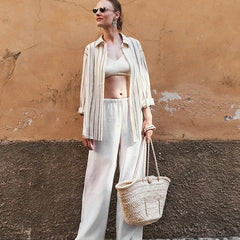 Knit wide-leg drawstring trousers for women, loose pull-on pants in soft fabric, featuring a relaxed fit and comfortable waistband.