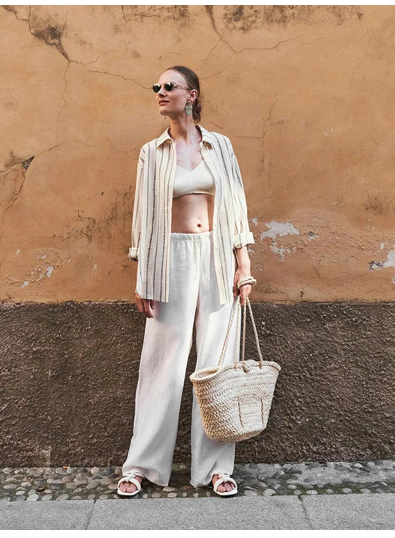 Knit wide-leg drawstring trousers for women, loose pull-on pants in soft fabric, featuring a relaxed fit and comfortable waistband.
