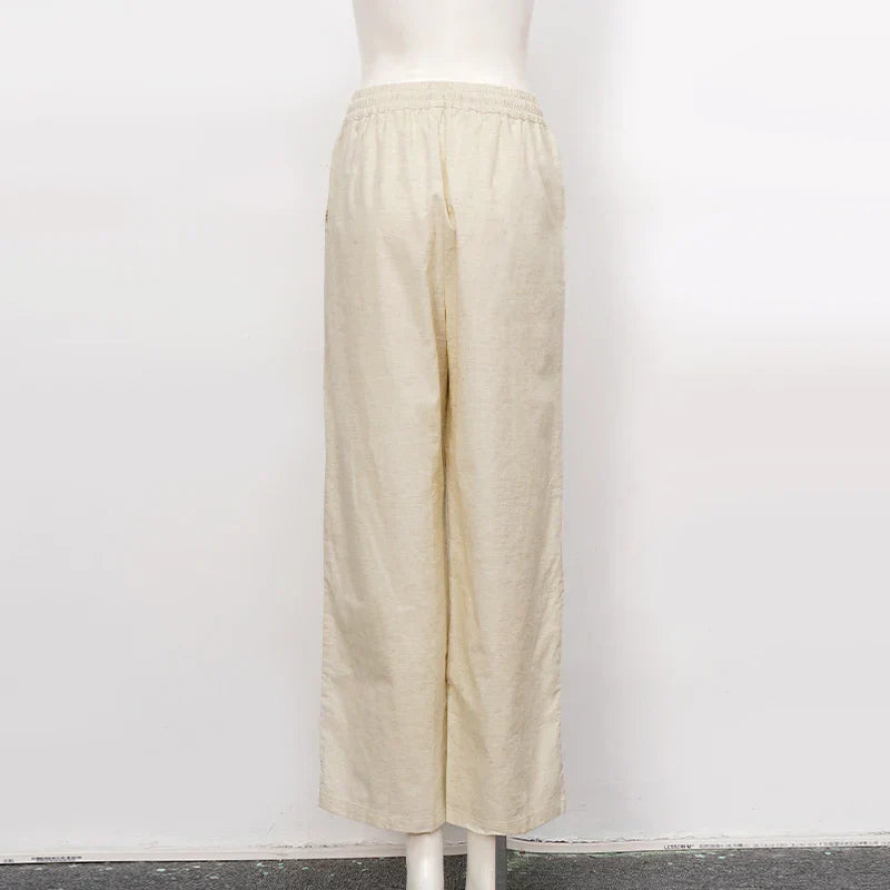 Light beige cotton linen wide-leg drawstring trousers for women with a loose fit and pull-on design, perfect for casual wear.