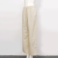 Women’s cotton linen wide-leg drawstring trousers with a loose fit and pull-on style, ideal for casual and comfortable wear.
